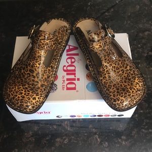 Brand new never worn Alegria open back wedges.